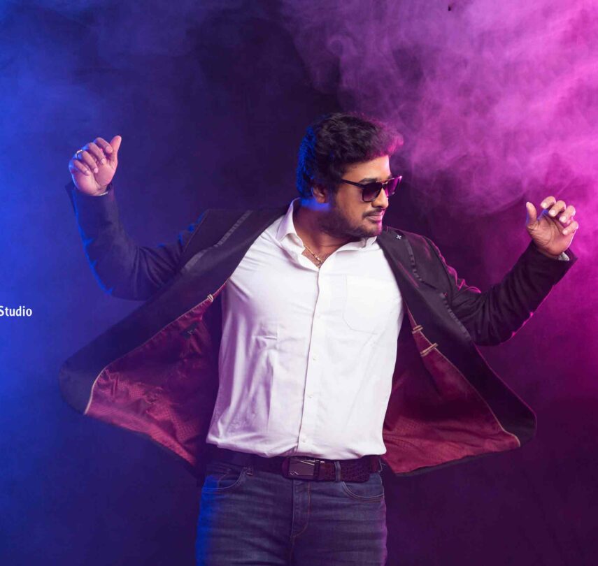 portrait of a man in blue background